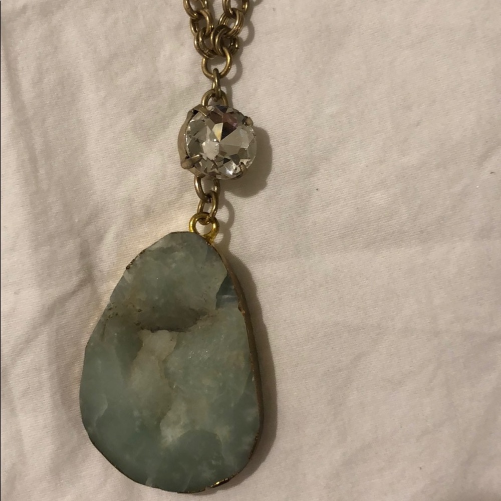 Long gold jewel and rhinestone necklace